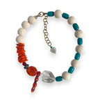 Krystallos Turquoise, Lava Rock, Clear Quartz and Coral Necklace